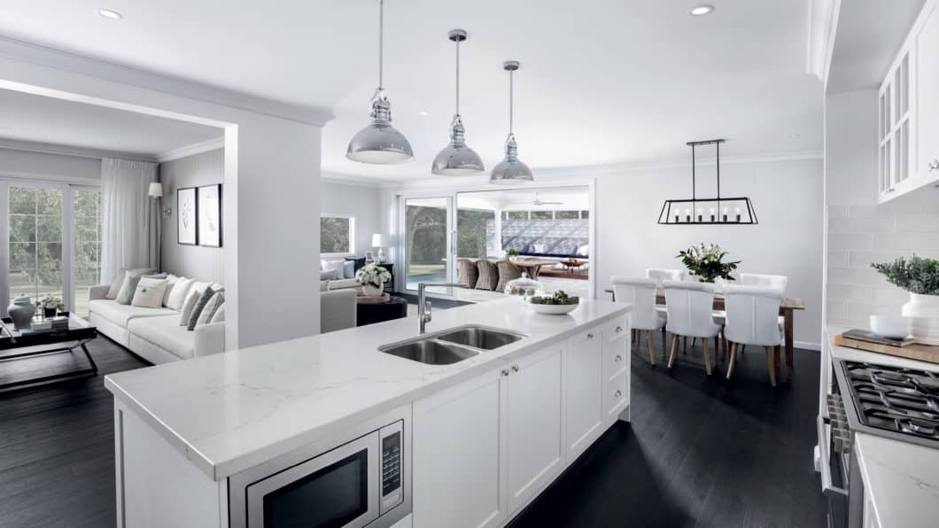 Hamptons kitchen with white background benches with fine dark grey spider veins.